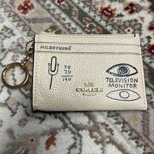 Coach x Basquiat skinny ID case